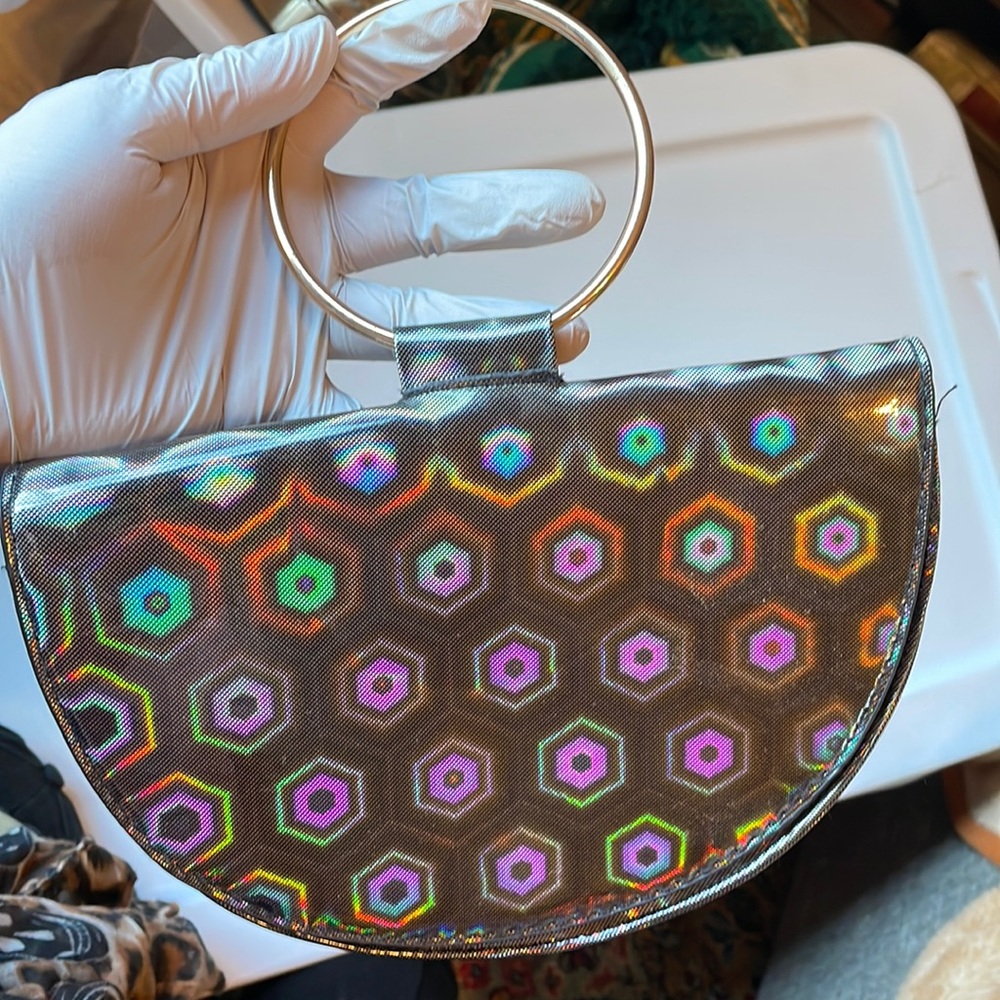 Holographic clutch/wristlet